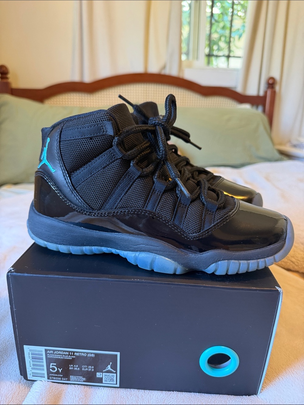 Jordan 11 Retro Men’s Sneakers - Black with Teal Accents